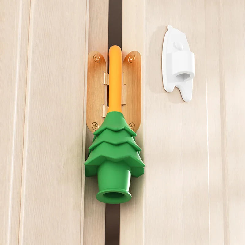 Pine tree shaped door guard installed
