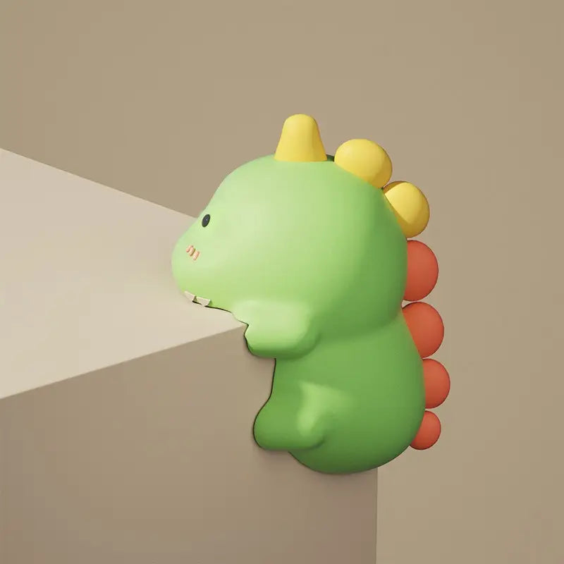 Dinosaur corner protector mounted on a table corner