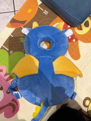 Real customer photo — bee character PumPom Kids cushion