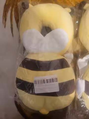 Real customer photo — butterfly character PumPom Kids cushion close-up